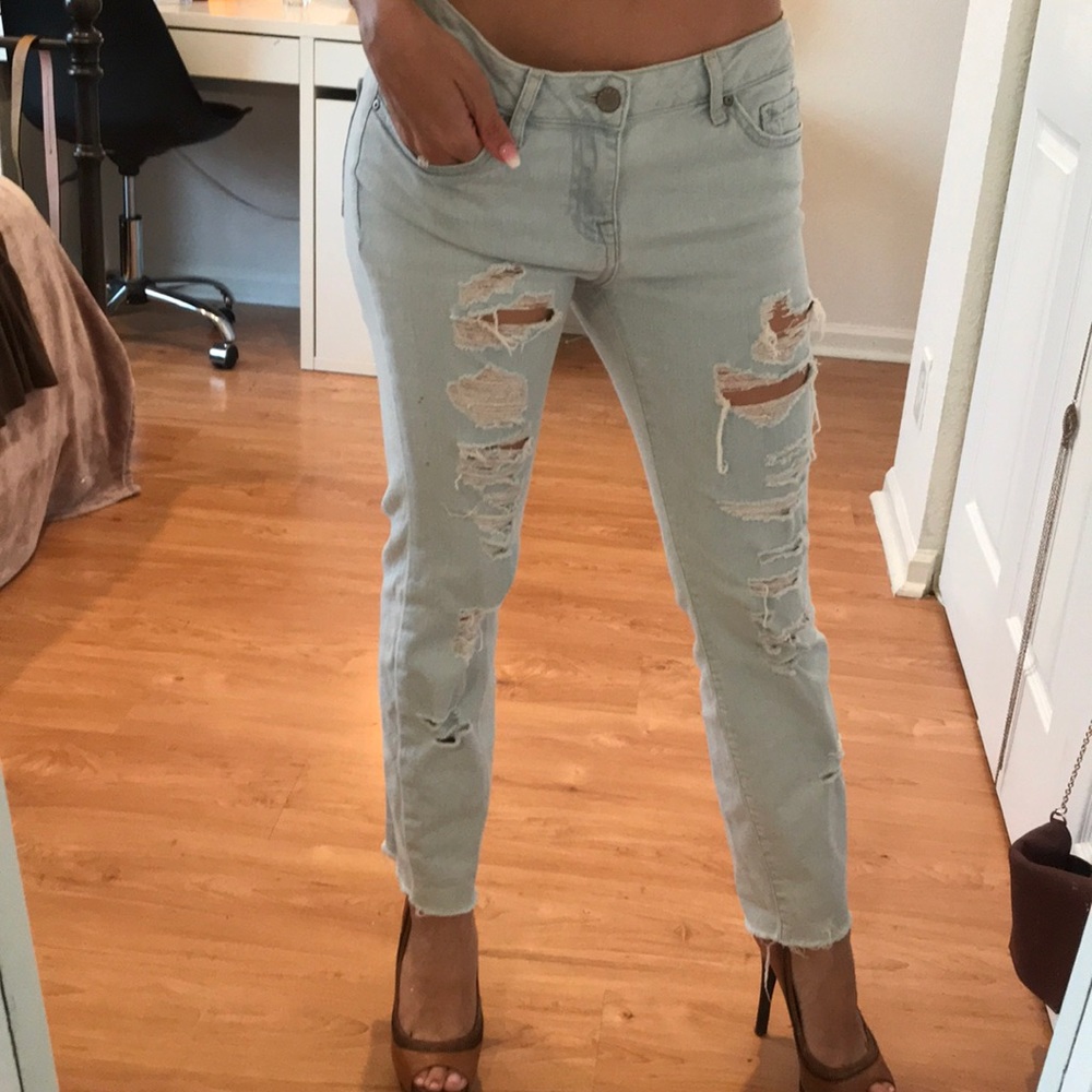 Low rise, light wash distressed boyfriend jeans